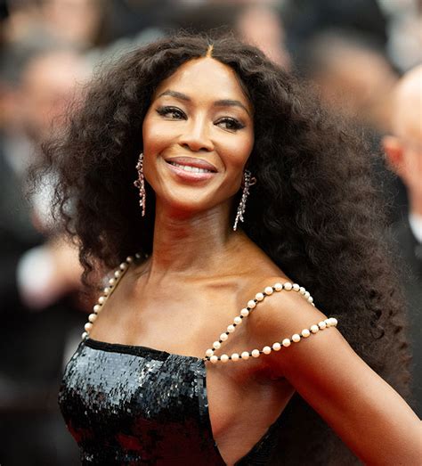 Naomi Campbell’s Bikini Pics Have Fans Asking, “What The Hell 